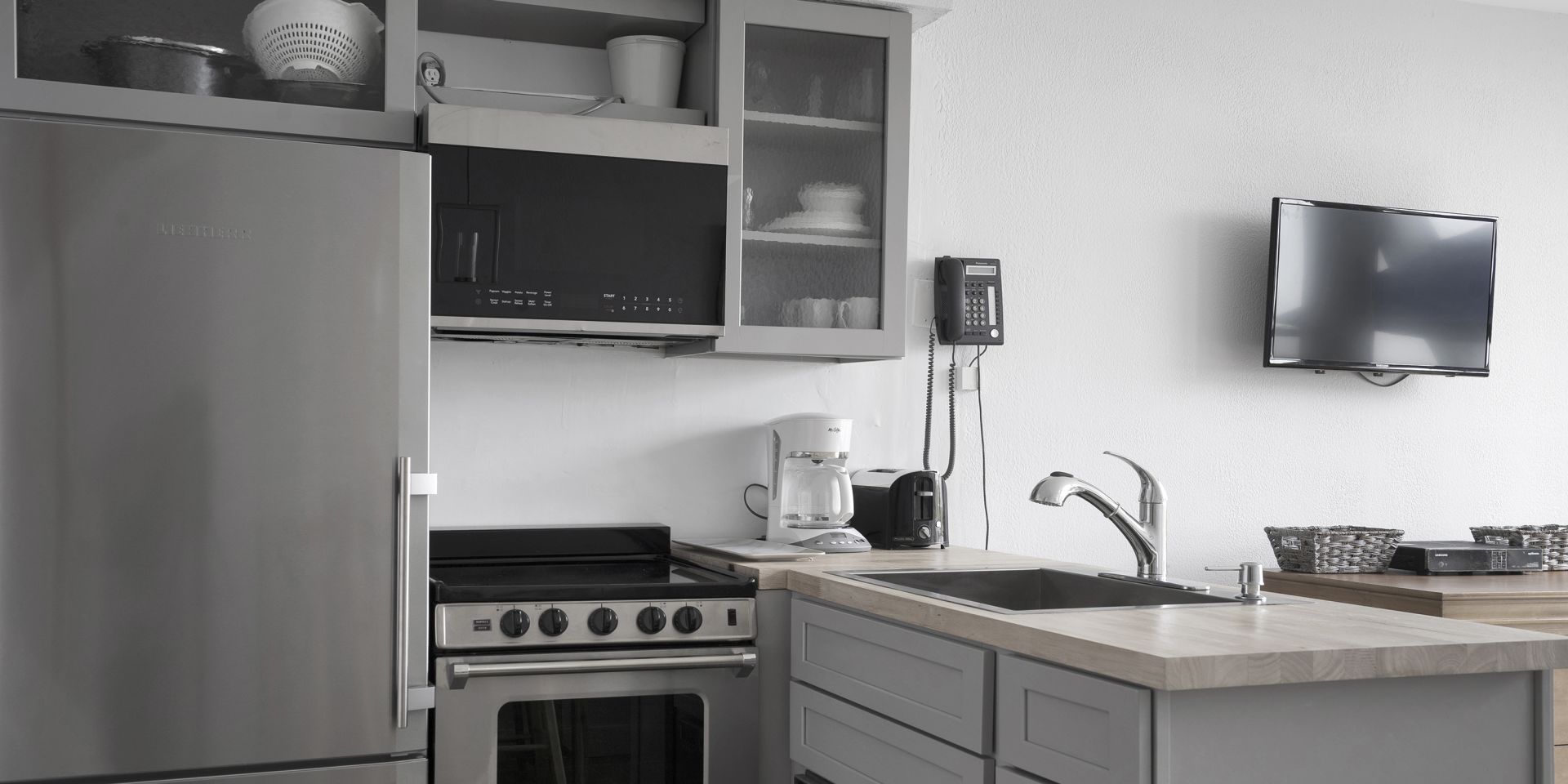 A Stove Top Oven Sitting Inside Of A Kitchen